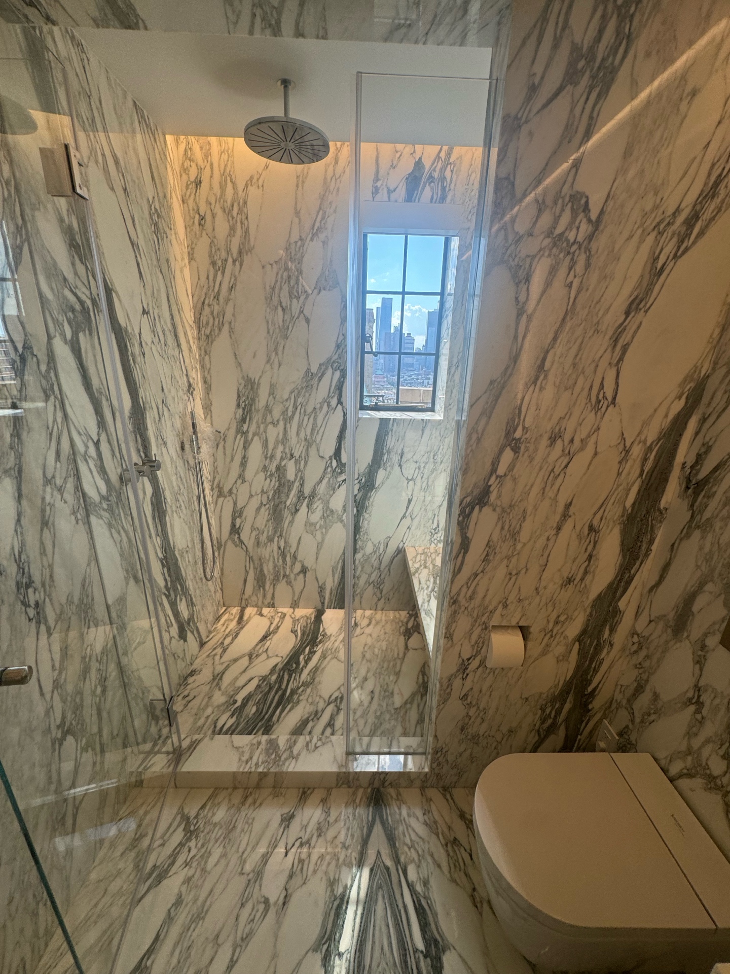 Arabescato Marble Shower with NYC Skyline