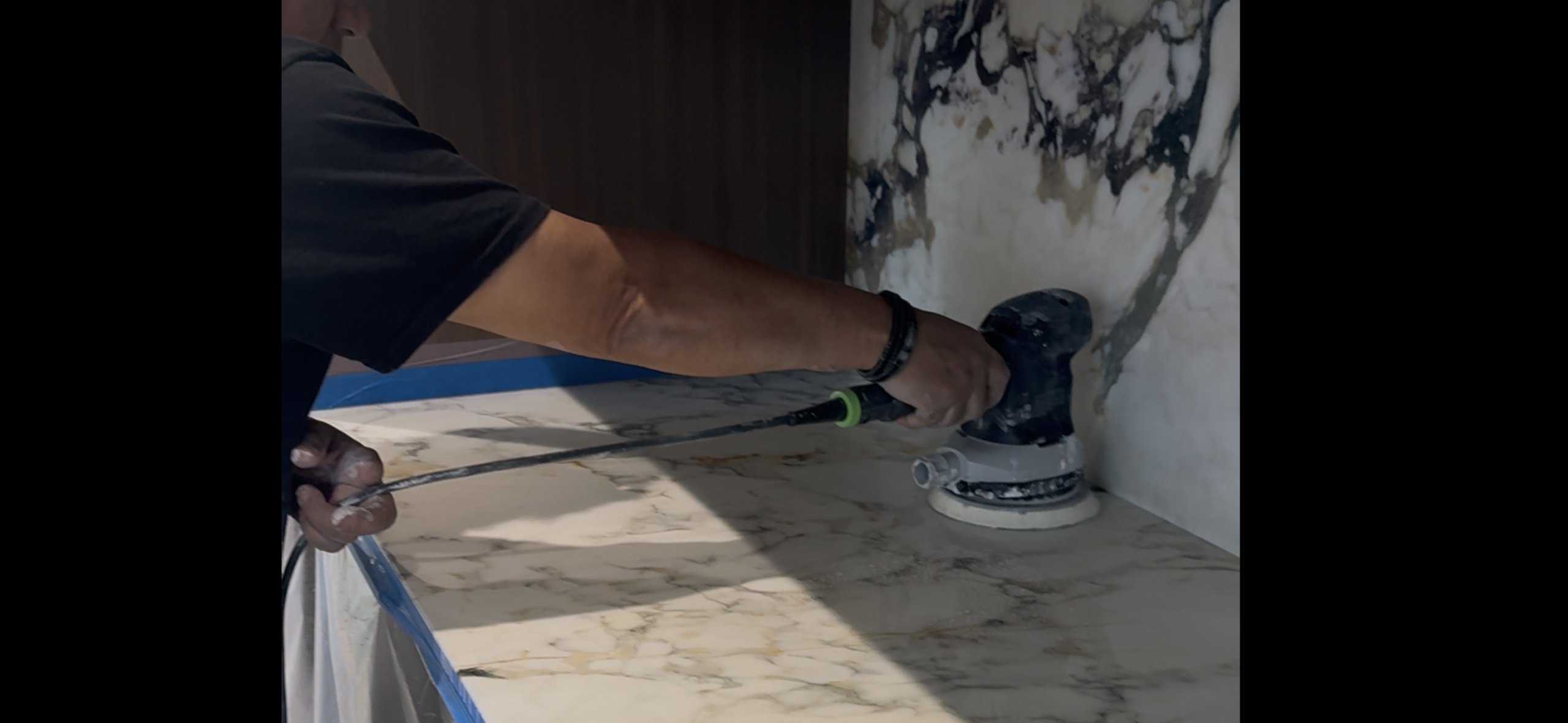 High Line Stone Care technician polishing marble countertop
